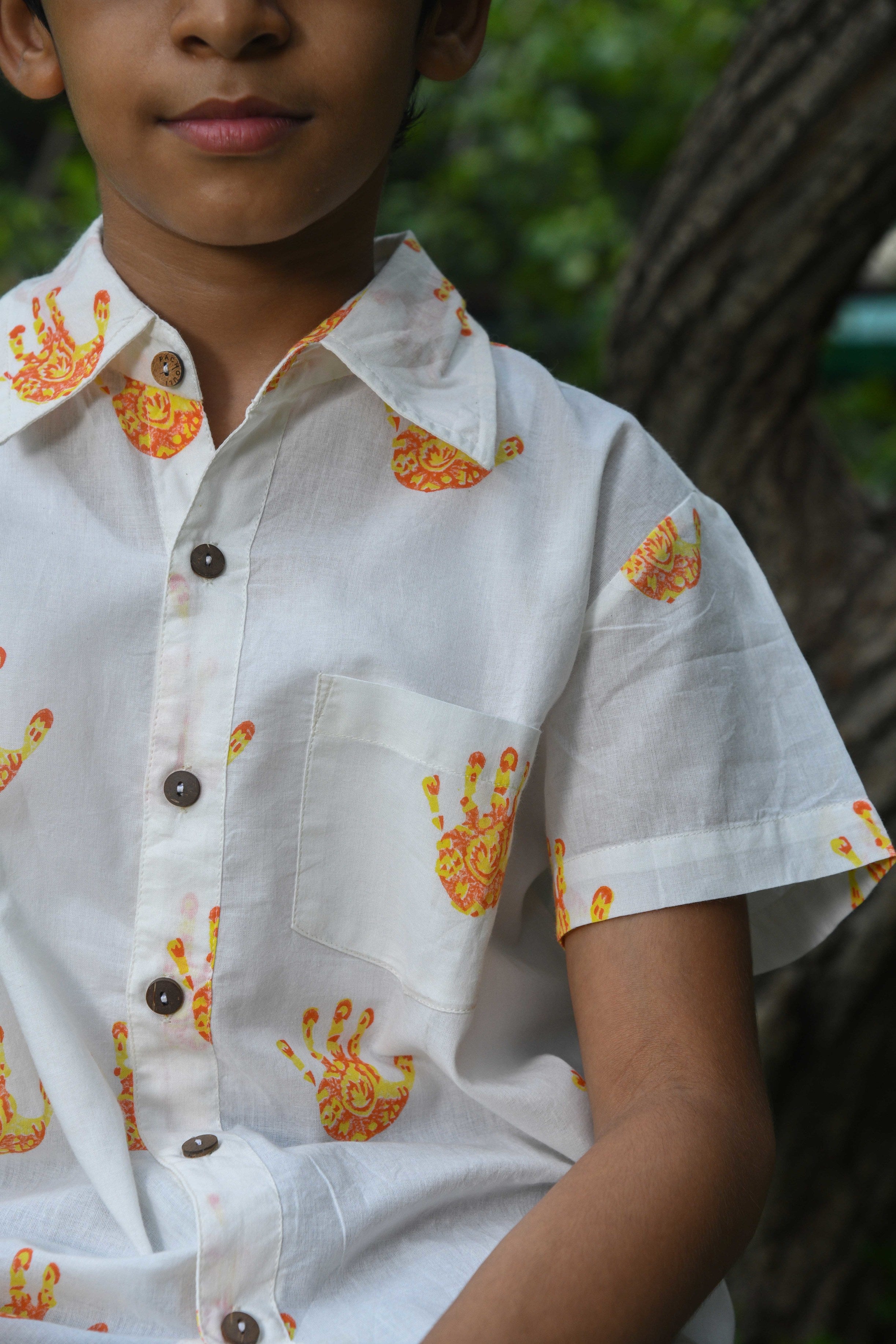 Boy Hand Orange Prints